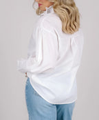White Ruffle Button Down Shirt with Rhinestone Buttons